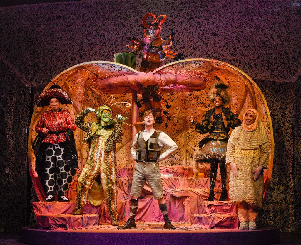 Christopher Sykes in a colorful ensemble stage production